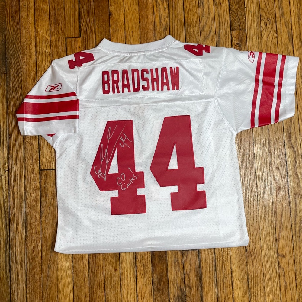 Vintage signed by Ahmad Bradshaw from the New York giants youth jersey